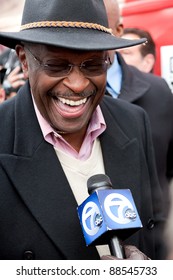 YPSILANTI, MI - NOVEMBER 10th: Presidential Candidate Herman Cain Laughs With Reporters, November 10, 2011 In Ypsilanti, MI