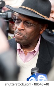 YPSILANTI, MI - NOVEMBER 10th: A Stern Faced Herman Cain Meets With Reporters, November 10, 2011 In Ypsilanti, MI