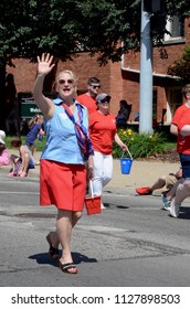 YPSILANTI, MI / USA - JULY 4, 2018:  Michigan State Senator Rebekah Warren Marches In The Ypsilanti Fourth Of July Parade. 