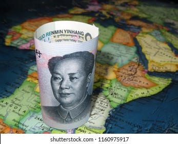 Yuan On Part Of The Map Of Africa, Selective Focus. Chinese Investment In African Economy