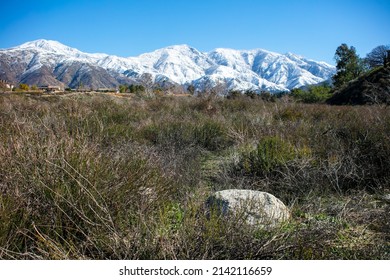 Yucaipa, California, Flood Control Groundwater Percolation Site With The Snow Capped Mountains In The Background Showing Hydrology And Run-off Measures Design