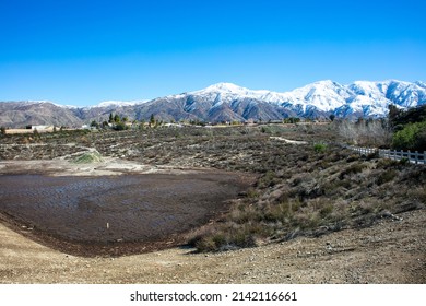 Yucaipa, California, Flood Control Groundwater Percolation Site With The Snow Capped Mountains In The Background Showing Hydrology And Run-off Measures Design