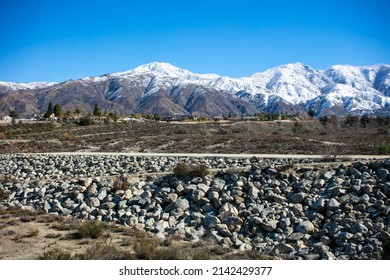 Yucaipa, California, Flood Control Groundwater Percolation Site With The Snow Capped Mountains In The Background Showing Hydrology And Run-off Measures Design