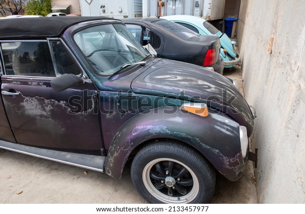 Yucaipa, California,\
March 3, 2022: Vintage Volkswagon Bugs and Vehicles and Cars Under\
Remodeling and Repair