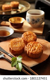 Yue Bing. Traditional Chinese Pastry Of Baked Mooncake To Celebrate The Mid-Autumn Festival. The Chinese Characters On One Of The Cake Mean Mid-Autumn.