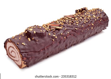 a yule log cake, traditional of christmas time, on a white background