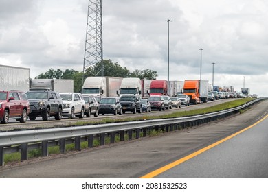 Yulee, USA - July 6, 2021: Interstate Highway I95 Driving Car Pov Near Jacksonville, Florida And Long Line Traffic Jam Of Many Trucks Vehicles Stuck Due To Accident On Road