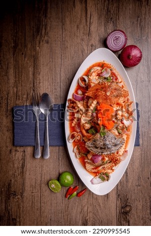 Yum, Spicy salad, spicy Thai food, mixed on the table,Collection set of Spicy salad (Yum Thai style) Traditional spicy -hot seafood, egg Thai food. Thai cuisine delicious food popular
