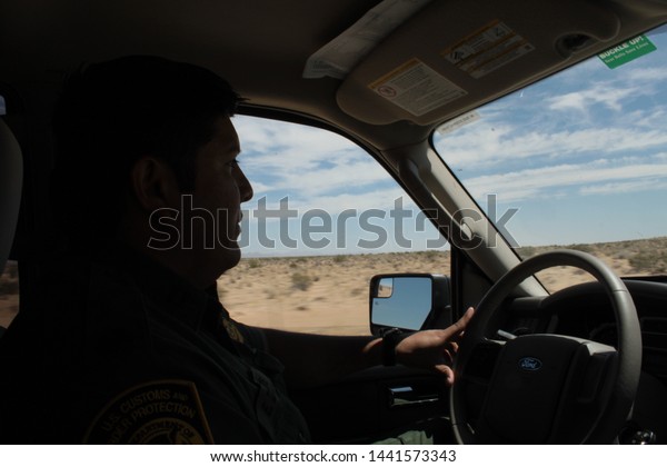 Yuma Sector, Ariz. / US - April 11, 2013: A Customs\
and Border Protection agent during a shift along the US-Mexico\
border. 1502