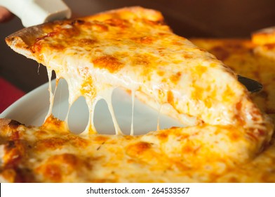 Yummy Cheese Pizza Lifting Up