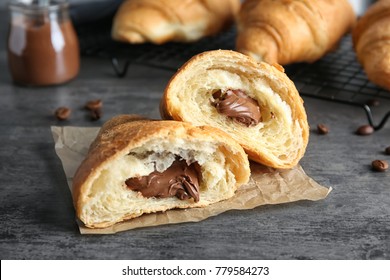 Yummy Fresh Croissant With Chocolate On Table