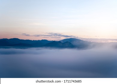 Yun Rai misty mountain foggy sunrise view point. Trendy destination tourism and backpacker on winter. At Pai distict, Mae Hong Son, Thailand. - Powered by Shutterstock