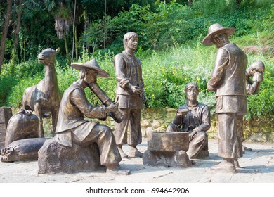YUNNAN, CHINA - Aug 26 2016: Caravan Statues at Ancient Tea Horse Road in Fengyangyi ancient village. a famous historical site in Dali, Yunnan, China.
