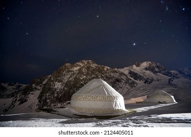 Yurt Under The Stars Night In Winter In The Mountains Of Kazakhstan. Shymbulak, Almaty.