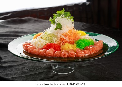 Yusheng, yee sang or yuu sahng usually consists of strips of raw fish (sometimes salmon), mixed with shredded vegetables and a variety of sauces and condiments, among other ingredients.