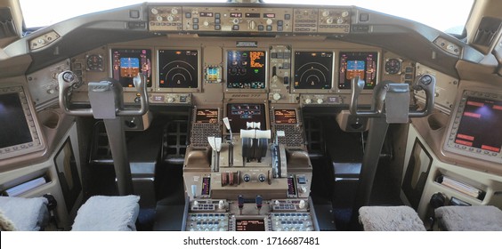 Yuzhno-Sakhalinsk, Russia, February 21, 2020. Boeing 777 pilots cockpit with instruments and flight controls.