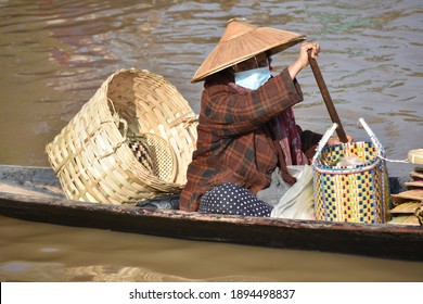 Ywama, Inle Lake, Myanmar - Jan 15 2020: Asian People Wear Face Masks At The Floating Market 