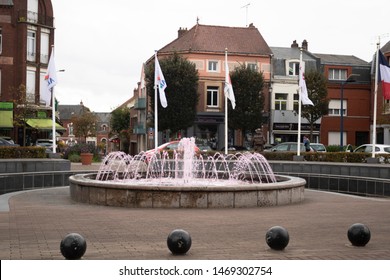 Yypres, Begium, Europe,  9/18/2018, The Main Square  Anzac Day Fountain And Statue Of An ANZAC Soldier By The Church. 