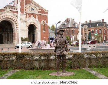 Yypres, Begium, Europe,  9/18/2018, The Main Square  Anzac Day Fountain And Statue Of An ANZAC Soldier By The Church. Wide View