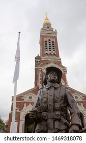 Yypres, Begium, Europe,  9/18/2018, The Main Square  Anzac Day Fountain And Statue Of An ANZAC Soldier In Front The Church. 