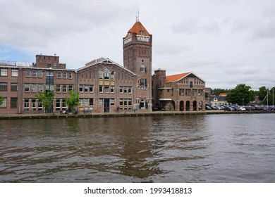Zaandam, The Netherlands - June 11, 2019; View of the West side of the Achterzaan with the factories of the Verkade company. 