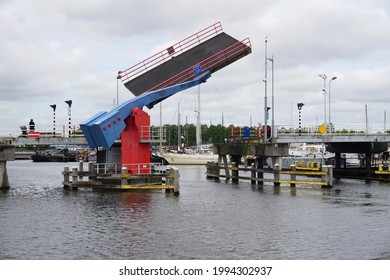 Zaandam, The Netherlands - June 11, 2019; The special William Pont Bridge connects the island with the city of Zaandam and it opens up the Marina Dukra. 