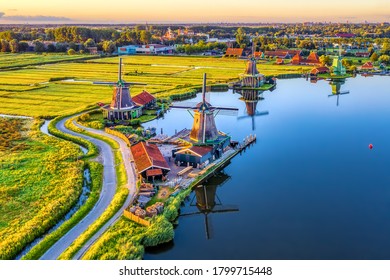 Zaanse Schans Windmills Park And Fields Landscape In Zaandam Near Amsterdam, North Holland, Netherlands, Aerial View In Sunrise Light