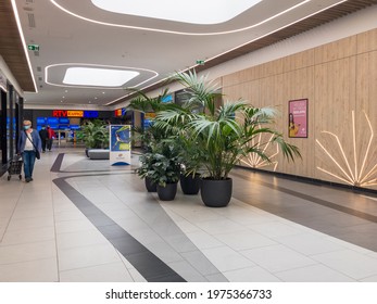 Zabrze. Poland 8 Maj 2021. Young people shopping mall in Platan City Center Zabrze. Interior of retail centre store in soft focus. People shopping in modern commercial mall center