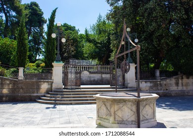 Zadar, Croatia; 7/17/2019: Entrance Of Ledana Lounge Bar & Night Club In The Five Wells Square, With A Well At The Foreground, In Zadar, Croatia