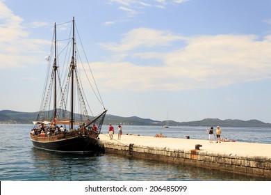 ZADAR, CROATIA - JULY 15, 2014: Wooden Tourist Ship Anchored In The Harbor Waiting For Tourists To Come Aboard