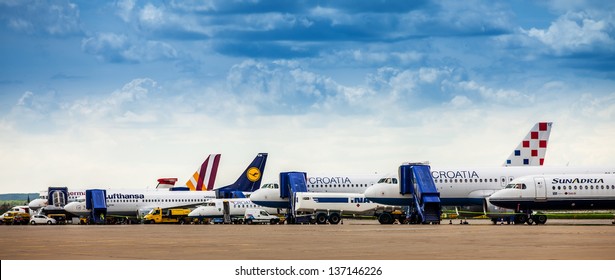 ZAGREB, CROATIA - APR 28: Aircrafts parked at Pleso Airport on April 28, 2013 in Zagreb, Croatia. Reconstruction of the airport and construction of a new terminal are planned to begin by August 2013.