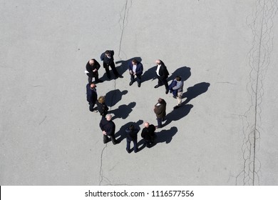 ZAGREB, CROATIA - April 10: A Top Aerial View Of A Group Of Unidentifiable People Forming A Circle And Discussing, Zagreb, Croatia On April 10, 2015.