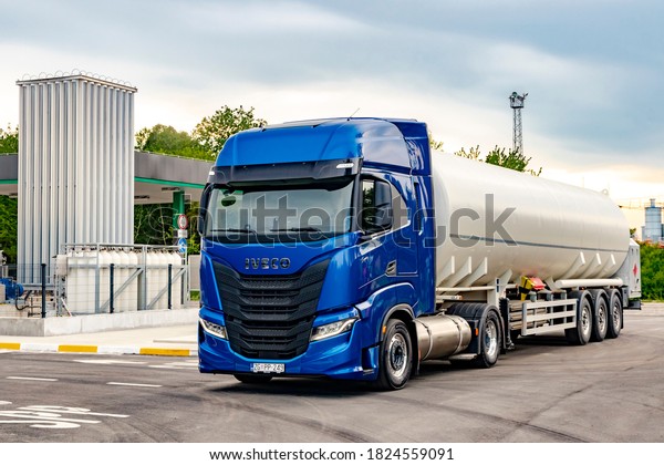 Zagreb,\
Croatia - April 28, 2020: Iveco Stralis S460 CNG (compressed\
natural gas) powered long haul truck driving on a highway. CNG is\
the cleanest burning alternative fuel\
available.
