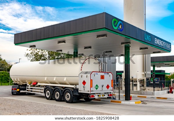 Zagreb, Croatia - April 28, 2020: Iveco\
Stralis S460 CNG (compressed natural gas) powered long haul truck\
refueling on a CNG  station. CNG is the cleanest burning\
alternative fuel\
available.