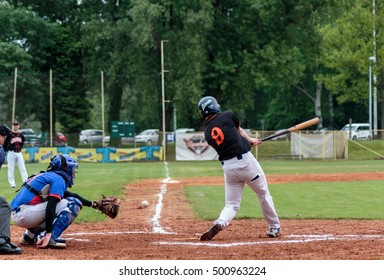 ZAGREB, CROATIA - APRIL 30, 2016: Baseball Batter Swing At The Ball And Miss The Shot. Baseball Match Between Baseball Club Zagreb And Janossomorja Rascals. 