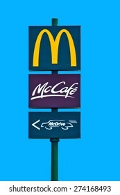 ZAGREB , CROATIA - April 30th , 2015 : Mc Donald's , Mc Cafe And Drive In Signs On The Blue Sky  ,product Shot