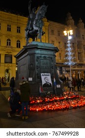 ZAGREB, CROATIA - DECEMBER 2.2017: General Slobodan Praljak Picture And Candles At Ban Jelacic Monument At The Main Jelacic Square After His Suicide In The Hague Court.