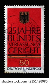 ZAGREB, CROATIA - JULY 03, 2014: A Stamp Printed In Germany Shows German Eagle, 25th Anniversary Of Federal Constitutional Court In Karlsruhe, Circa 1976