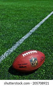 ZAGREB , CROATIA - JULY 18 ,2014 :  Official Ball Of The NFL Football League , The Duke On Grass Turf Background , Product Shot