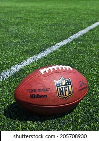 ZAGREB , CROATIA - JULY 18 ,2014 :  Official Ball Of The NFL Football League , The Duke On Grass Turf Background , Product Shot