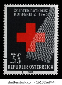 ZAGREB, CROATIA - JUNE 25, 2014: A Stamp Issued In The Austria Shows Strip Of Gauze In Front Of Red Cross, Red Cross And Red Crescent Series, Circa 1965.