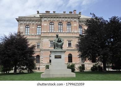 ZAGREB / CROATIA - JUNE 8 2012:  Bronze statue of seated Josip Juraj Strossmayer, by Ivan Meštrović, on Strossmayerain Park in Lower Town, in front of The Strossmayer Gallery of Old Masters.