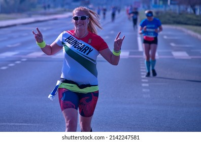 Zagreb, Croatia - March 27, 2022: Active Mature Woman Running Marathon Race