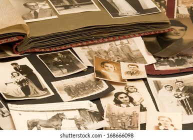 ZAGREB, CROATIA - MAY 5, 2010: Vintage Photo Album With Family Photos In And Under The Album, Illustrating The Concept Of Family History And Genealogy Research.