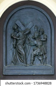 ZAGREB, CROATIA - NOVEMBER 12, 2012: 5th Stations Of The Cross, Simon Of Cyrene Carries The Cross, St Francis Xavier's Church In Zagreb, Croatia