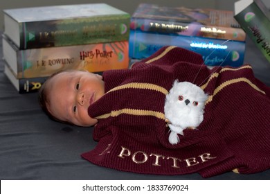 Zagreb / Croatia - October 12th, 2020: Newborn Baby Boy In Costume For Halloween With A Scarf And Books Of Harry Potter