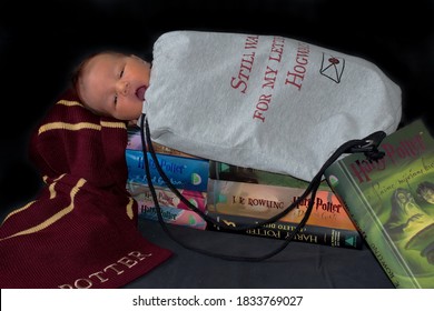 Zagreb / Croatia - October 12th, 2020: Newborn Baby Boy In Costume For Halloween With A Scarf And Books Of Harry Potter