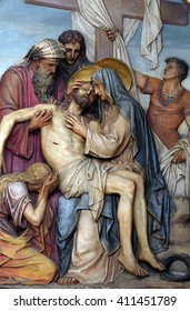 ZAGREB, CROATIA - SEPTEMBER 14: 13th Stations of the Cross,Jesus' body is removed from the cross, Basilica of the Sacred Heart of Jesus in Zagreb, Croatia on September 14, 2015