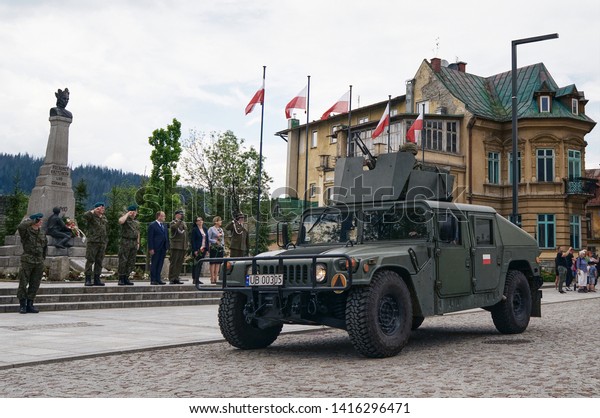 Zakopane, Poland, 06 04 2019: Military parade\
at the end of the military school drill list at Independence Square\
at the Grunwald monument in\
Zakopane