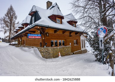 Zakopane, Poland- February 06, 2020: Mountain Wooden House Covered With Snow